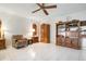 Well-lit bedroom features neutral walls, tile flooring, and ample storage space, creating a serene retreat at 4513 Hidden River Rd, Sarasota, FL 34240