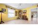 Bedroom with natural light, tile floors, and storage, offering a comfortable and functional retreat at 4513 Hidden River Rd, Sarasota, FL 34240