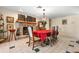 Dining room with brick fireplace, chandelier, and space for entertaining, perfect for gatherings at 4513 Hidden River Rd, Sarasota, FL 34240
