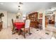 Dining room with chandelier, table, and charming decor, creating a warm and inviting atmosphere at 4513 Hidden River Rd, Sarasota, FL 34240