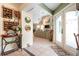 Light-filled foyer showcases stylish decor, ceramic tile flooring, and a seamless transition to the spacious living area at 4513 Hidden River Rd, Sarasota, FL 34240