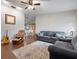 Comfortable living room with hardwood floors, ceiling fan, and neutral color palette at 4513 Hidden River Rd, Sarasota, FL 34240