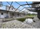 Enclosed pool area with a hot tub and brick surround, perfect for relaxation at 4513 Hidden River Rd, Sarasota, FL 34240