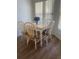 Bright dining room features table with six chairs at 4520 47Th W Ave # 103, Bradenton, FL 34210