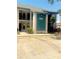 Two-story condo building with assigned parking and well-maintained landscaping at 4520 47Th W Ave # 103, Bradenton, FL 34210