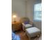 The main bedroom also includes a seating area by the window at 4520 47Th W Ave # 103, Bradenton, FL 34210