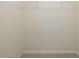 Empty walk in closet with tiled floors at 4565 Eldron Ave, North Port, FL 34286