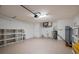 Clean garage interior with storage shelving and room for multiple vehicles at 4565 Eldron Ave, North Port, FL 34286