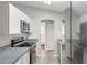 Bright, modern kitchen with stainless steel appliances, subway tile backsplash, and granite counters at 4565 Eldron Ave, North Port, FL 34286