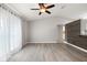 Spacious living room featuring neutral colors, vaulted ceiling, and modern light fixture at 4565 Eldron Ave, North Port, FL 34286