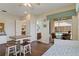 A well-lit bonus room with backyard views and access to a pool and patio at 4958 Gardiners Bay Cir, Sarasota, FL 34238