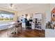 Bedroom providing ample natural light and scenic neighborhood views from a large window at 4958 Gardiners Bay Cir, Sarasota, FL 34238