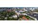 Wide aerial shot of the city showcasing the surrounding neighborhood and the coastline in the background at 525 N Orange Ave # 302, Sarasota, FL 34236