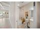 This bathroom features a shower with white tiling, modern fixtures, and neutral-toned decorations at 525 N Orange Ave # 302, Sarasota, FL 34236