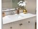 Bathroom detail showcases a modern vanity with a white countertop and brushed nickel faucet at 525 N Orange Ave # 302, Sarasota, FL 34236