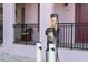 Apartment with charging station and black wrought iron bannister and stairs at 525 N Orange Ave # 302, Sarasota, FL 34236