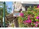 Close up of local business signage with landscaped bushes out front at 525 N Orange Ave # 302, Sarasota, FL 34236
