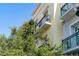Building exterior showing small wrought iron balconies at 525 N Orange Ave # 302, Sarasota, FL 34236