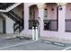 Apartment with charging station and black wrought iron bannister and stairs at 525 N Orange Ave # 302, Sarasota, FL 34236