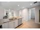 Bright kitchen featuring granite countertops, stainless steel appliances and an island with seating at 525 N Orange Ave # 302, Sarasota, FL 34236