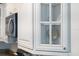 Cabinets with glass doors are on display, offering a modern and stylish design for the kitchen at 525 N Orange Ave # 302, Sarasota, FL 34236