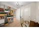 Comfortable home office with a bookshelf, bright natural light, and a view into the hall at 525 N Orange Ave # 302, Sarasota, FL 34236