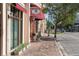 Street view showing sidewalks, shops and business offices in this outdoor shopping mall at 525 N Orange Ave # 302, Sarasota, FL 34236