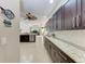 Spacious kitchen featuring dark wood cabinets, granite countertops, and stainless steel appliances at 5359 90Th Avenue E Cir, Parrish, FL 34219
