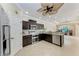 Modern kitchen featuring stainless steel appliances and beautiful granite countertops and cabinetry at 5359 90Th Avenue E Cir, Parrish, FL 34219