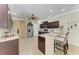 Modern kitchen with stainless steel appliances, granite countertops, and breakfast bar with seating at 5359 90Th Avenue E Cir, Parrish, FL 34219