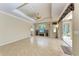 Bright and airy living room featuring tile floors, neutral walls, and sliding glass doors at 5359 90Th Avenue E Cir, Parrish, FL 34219