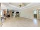 Spacious living room with tile floors, adjacent kitchen, and easy access to other rooms at 5359 90Th Avenue E Cir, Parrish, FL 34219