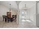 Dining room with decorative mirror and elegant chandelier at 5584 Eastwind Dr, Sarasota, FL 34233