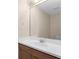 Close up view of bathroom vanity with a sleek sink, chrome faucet, and a minimalist design at 5981 Willows Bridge Loop, Ellenton, FL 34222
