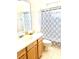 Bathroom featuring a tile floor, shower and vanity at 5981 Willows Bridge Loop, Ellenton, FL 34222