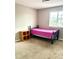 Bedroom features carpet floors and a window at 5981 Willows Bridge Loop, Ellenton, FL 34222