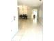 Bright dining room with tile flooring, seamlessly connecting to the living room at 5981 Willows Bridge Loop, Ellenton, FL 34222