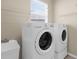 Functional laundry room featuring a utility sink, LG washing machine, and dryer at 5981 Willows Bridge Loop, Ellenton, FL 34222
