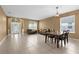 Spacious and bright living area showcasing a decorative entryway and tiled floors at 5981 Willows Bridge Loop, Ellenton, FL 34222