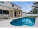 Screened-in pool, covered patio, a backyard great for entertaining and relaxing at 5981 Willows Bridge Loop, Ellenton, FL 34222