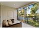 Inviting balcony with picturesque views of the lake and tropical surroundings at 6101 34Th W St # 11C, Bradenton, FL 34210