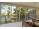 Spacious balcony offering stunning views of the lush landscaping and serene lake at 6101 34Th W St # 11C, Bradenton, FL 34210