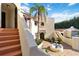 Inviting two-story condo with a fountain, terracotta tiled roof, and a charming courtyard entryway at 6101 34Th W St # 11C, Bradenton, FL 34210