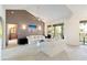 Bright living room featuring vaulted ceilings, neutral walls, and access to outdoor balcony at 6101 34Th W St # 11C, Bradenton, FL 34210