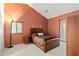 Main bedroom with high ceilings, accent wall and well-coordinated furnishings at 6101 34Th W St # 11C, Bradenton, FL 34210