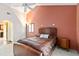 Inviting main bedroom featuring a vaulted ceiling, accent wall and neutral carpeting at 6101 34Th W St # 11C, Bradenton, FL 34210