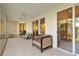 Relaxing patio featuring comfortable seating, tiled floors, and multiple sliding glass doors for easy indoor-outdoor living at 6101 34Th W St # 11C, Bradenton, FL 34210
