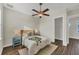 Serene bedroom with a comfortable bed, natural light, and a view to the closet at 634 Key Royale Dr, Holmes Beach, FL 34217