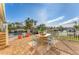 Outdoor patio area featuring a pool, canal view, and comfortable seating, ideal for entertaining at 634 Key Royale Dr, Holmes Beach, FL 34217