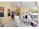 Relaxing outdoor patio featuring comfortable seating and views of the lush backyard at 6405 Alesheba Ln, Sarasota, FL 34240